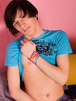 Emo twink gently caresses his slender body and jerking off his shaved dick during the photoshoot